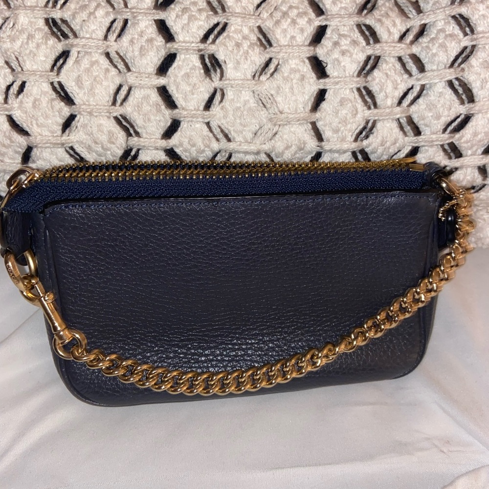 Small wristlet with gold ware chain, condition pre-owned new
